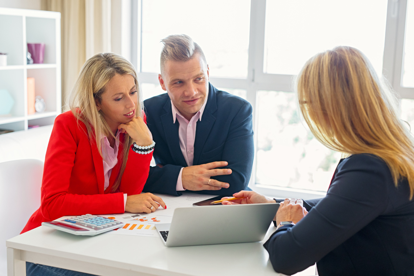 Couple Visiting Financial Adviser